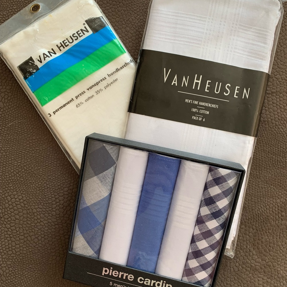 Three packages of men’s handkerchiefs.